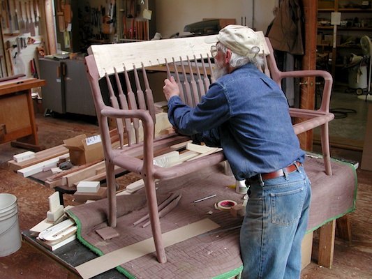 Edward working on settee