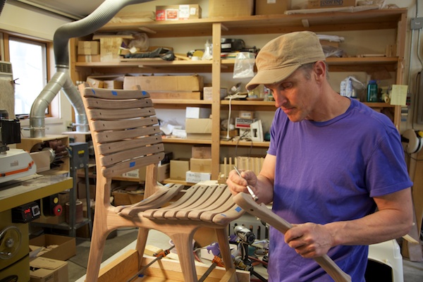 Steve works on a slat chair